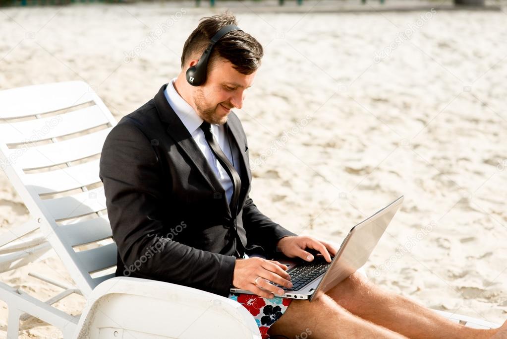 Businessman on the beach