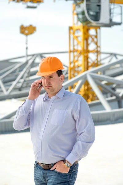 A foreman at the construction supervising the project. — Stock Photo, Image