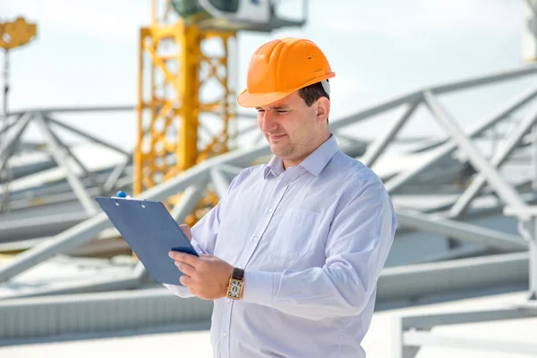 A foreman at the construction supervising the project. — Stock Photo, Image