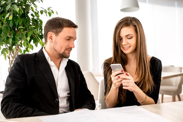 Young couple at the restaurant — Stock Photo, Image