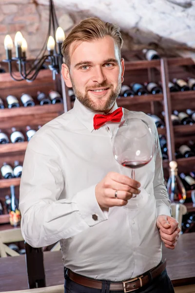 Sommelier in the wine cellar — Stock Photo, Image