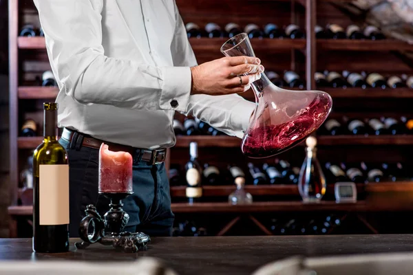 Sommelier in the wine cellar — Stock Photo, Image