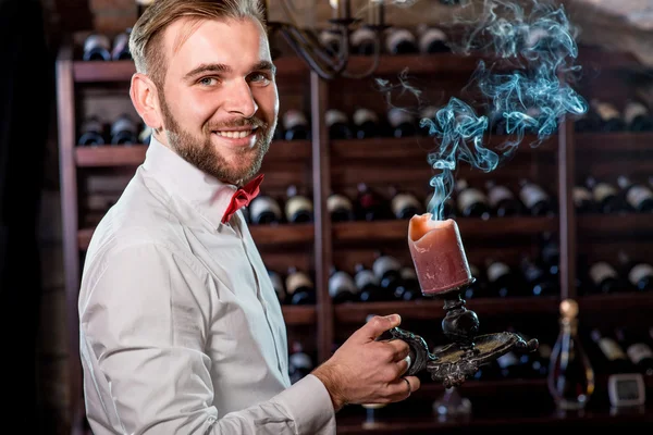 Sommelier in the wine cellar — Stock Photo, Image
