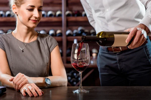 Sommelier with young woman on degustation in the cellar — Stock Photo, Image