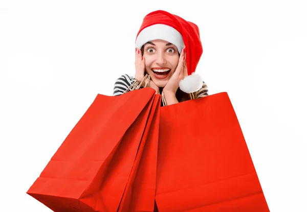 Jovem com sacos de compras no Natal — Fotografia de Stock