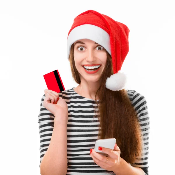 Mulher com cartão de crédito no Natal — Fotografia de Stock