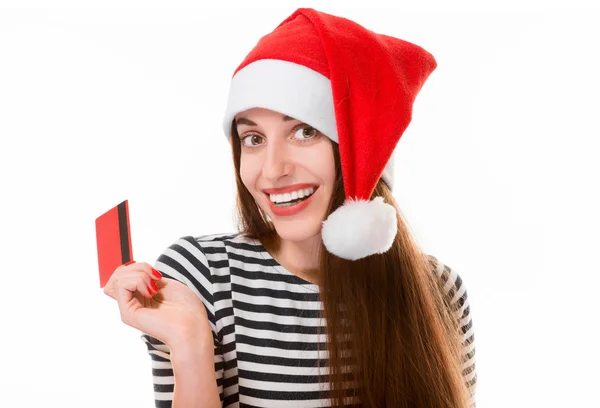 Женщина с кредиткой на Рождество — стоковое фото