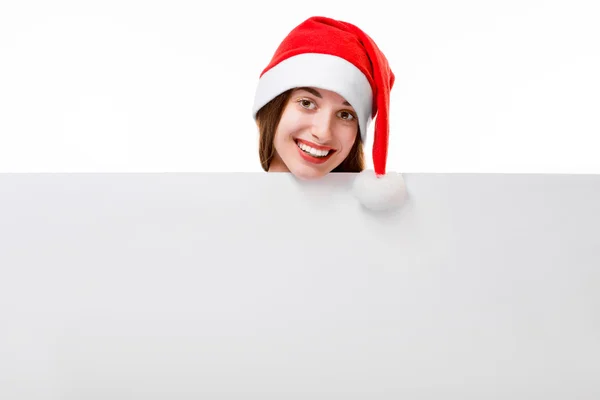 Jeune femme avec tableau blanc à Noël — Photo