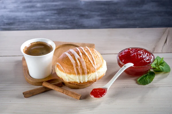 Donut with jam and coffee — Stock Photo, Image