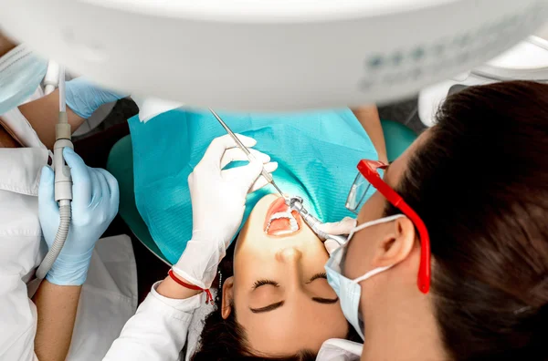 Professional teeth cleaning — Stock Photo, Image