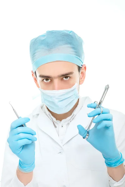 Zahnarzt operiert isoliert auf weißem Hintergrund — Stockfoto