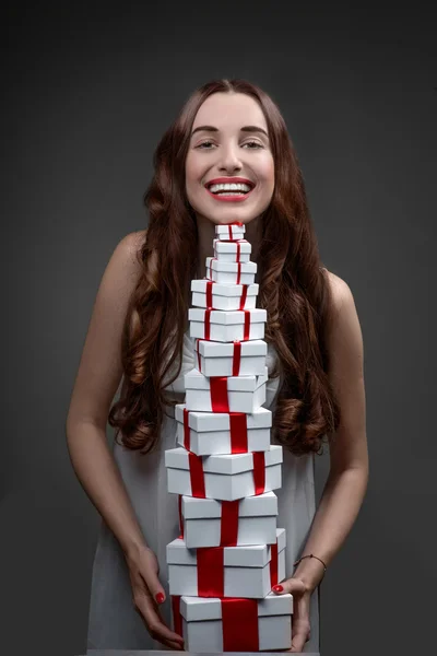 Woman with present boxes — Stock Photo, Image