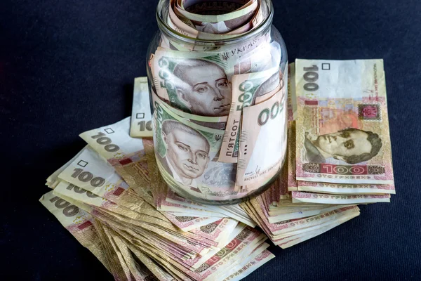 Ukrainian money in the jar — Stock Photo, Image