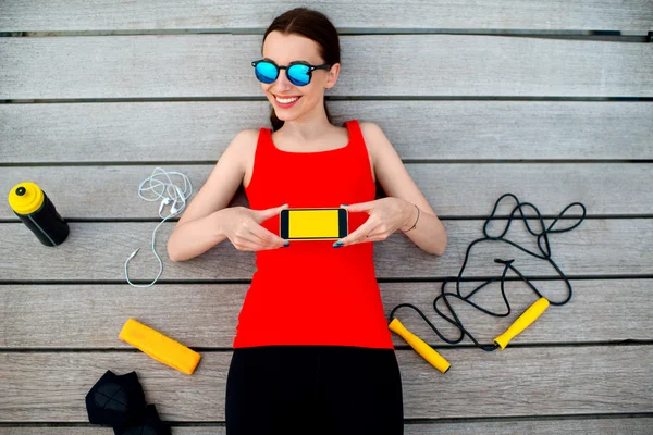 Sport woman on the sunbed — Stock Photo, Image