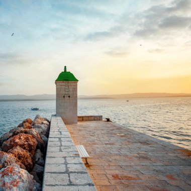 Lighthouse in Bol city, Croatia clipart