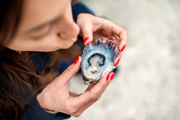 Eating fresh oyster