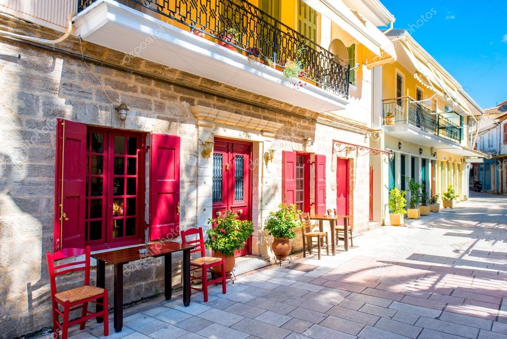 Street view with colorful old houses in Greece