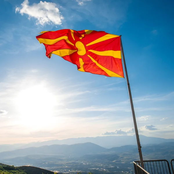 Macedonian flag on the sky background — Stock Fotó