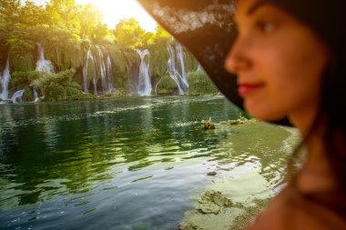 Woman tourist near Kravica waterfall