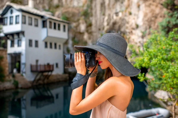 Woman photographing in Blagaj village — Stock Photo, Image