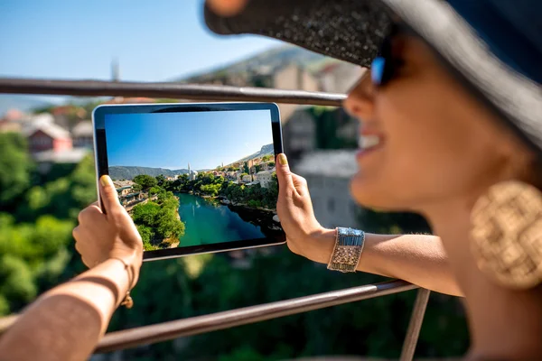 Photographing with digital tablet Mostar city — Zdjęcie stockowe