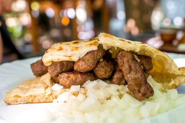 Cevapi with onion and bread — Stock Photo, Image