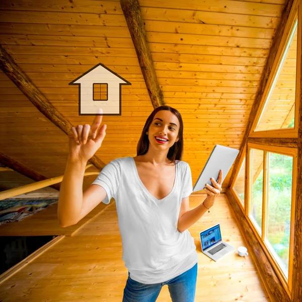 Mujer proyectando casa de campo —  Fotos de Stock