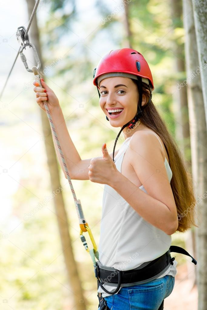 Woman riding on a zip line