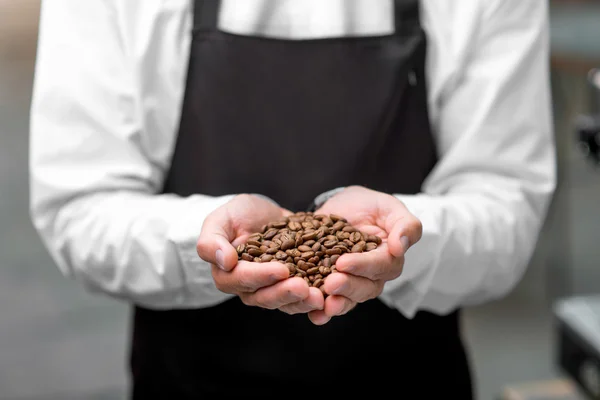 Sostiene granos de café — Foto de Stock