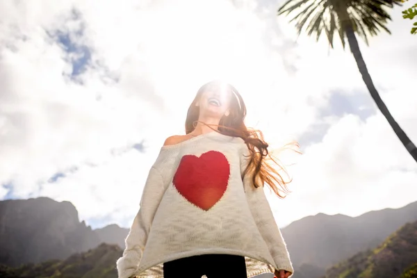 Happy woman jumping against the sky — Stock Photo, Image