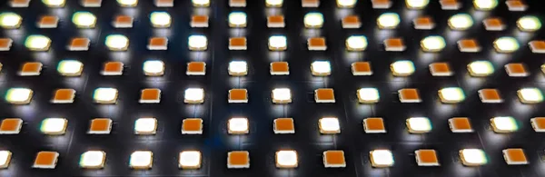 Led light panel close up on dark background; The efficient  energy at low cost