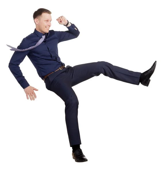 Uomo d'affari in una posizione di caduta, su bianco — Foto Stock