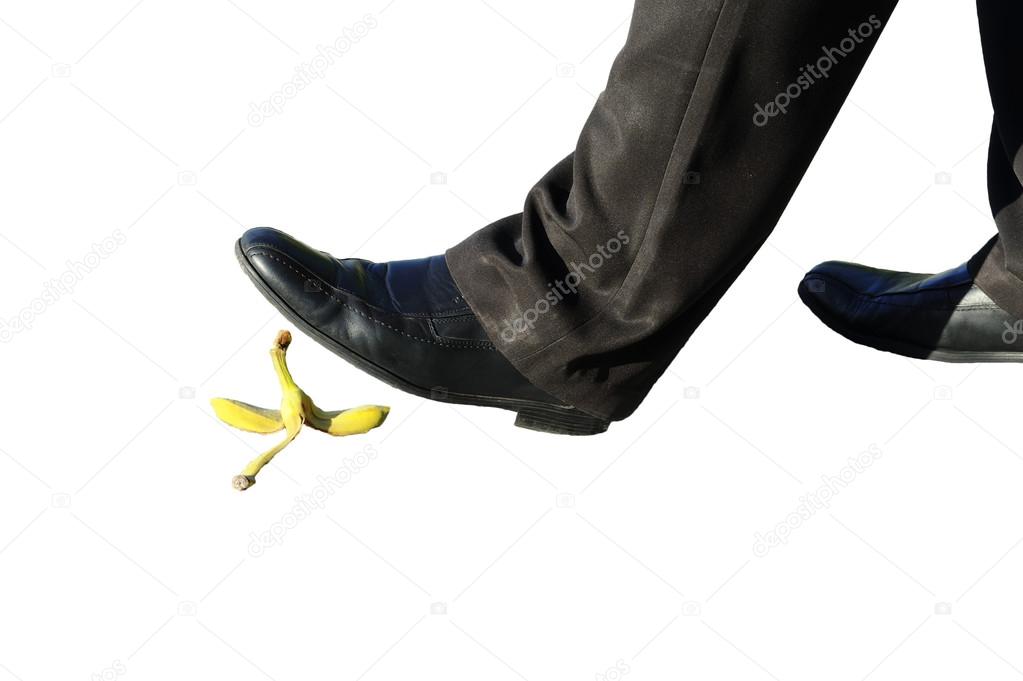 Business man and banana peel