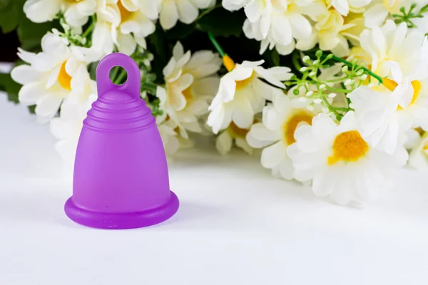 Menstrual cup and flowers — Stock Photo, Image