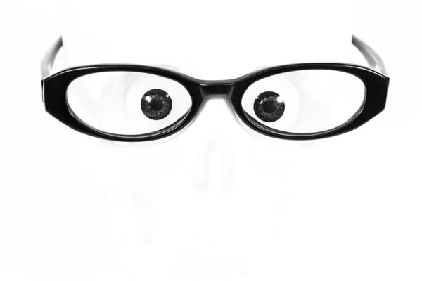 Black glasses and eyes — Stock Photo, Image