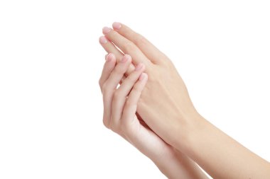 Beyaz arka planda izole edilmiş güzel kadın elleri. Spa bakım konsepti