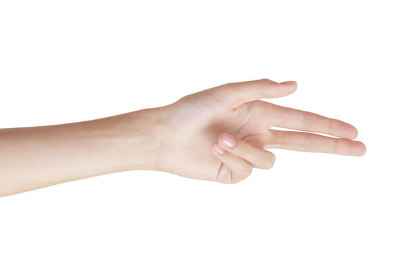 beautiful woman hand on a white background gesture with two fingers to the side. isolate