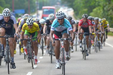 Kuantan - 6 Şubat: Kuantan160 6 Şubat 2013 yılında Kuantan, Pahang, Malezya doğum sırasında eylem kimliği belirsiz bisikletçiler. Kuantan şehir etrafında bir kar amacı gütmeyen, yarış 160 km Bisiklete binmek Kuantan160 olduğunu.