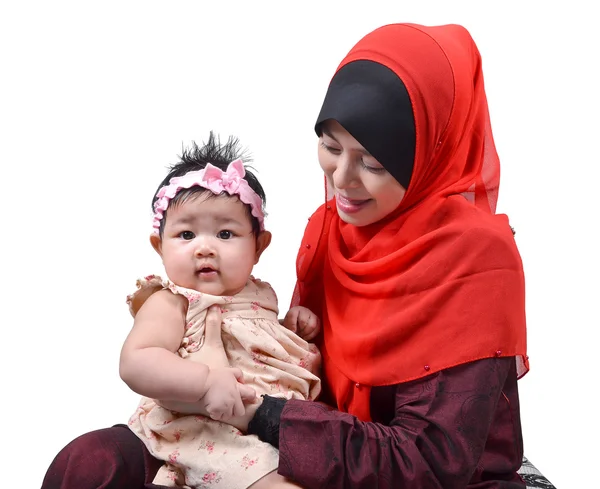 Young Asian muslim mother playing and smiling with her cute baby girl isolated on white background — Stock Photo, Image