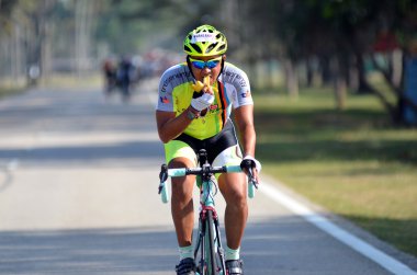 Kuantan - Haziran 1: 1 Haziran 2014 yılında Kuantan, Pahang, Malezya üzerinde Kuantan160 sırasında eylem kimliği belirsiz bisikletçiler. Kuantan şehir etrafında bir kar amacı gütmeyen, yarış 160 km Bisiklete binmek Kuantan160 olduğunu.