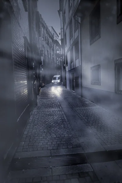 Oporto narrow street at misty dawn — Stock Photo, Image