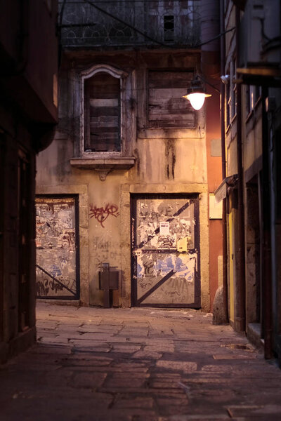 Old grunge alley from Oporto, Portugal, by night
