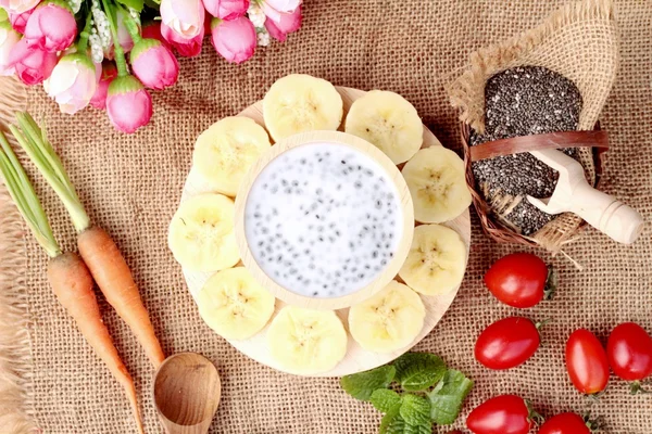 Chia seeds with milk and banana delicious — Stock Photo, Image