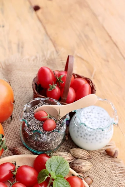 Chia seeds with milk and tomato delicious — Stock Photo, Image