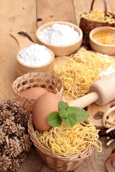 Making noodle with wheat flour and egg for cooking. — Stock Photo, Image