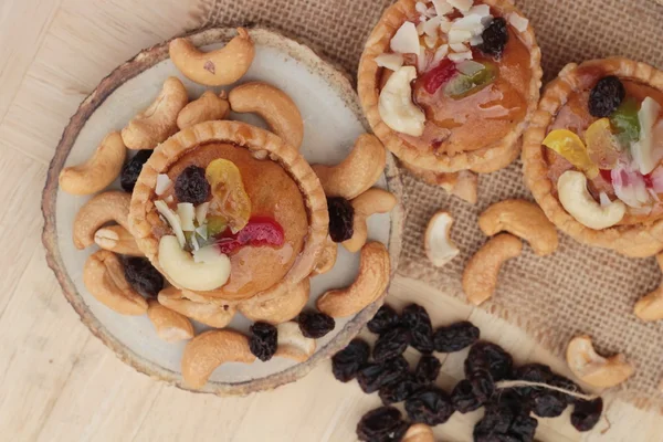 Mini almendras, tarta de frutas es delicioso —  Fotos de Stock