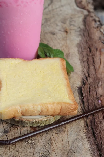 Strawberry milk and bread butter is delicious — Stock Photo, Image