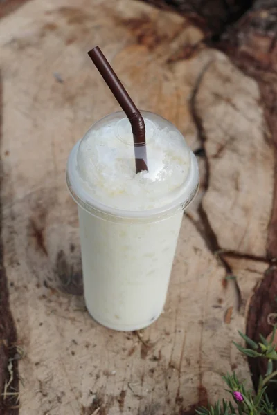 Iced milk is delicious on wood background. — Stock Photo, Image