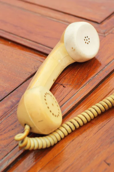 Régi telefon vintage stílusú fa padló. — Stock Fotó