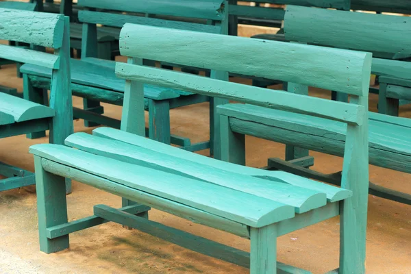 Wood bench green a lot — Stock Photo, Image